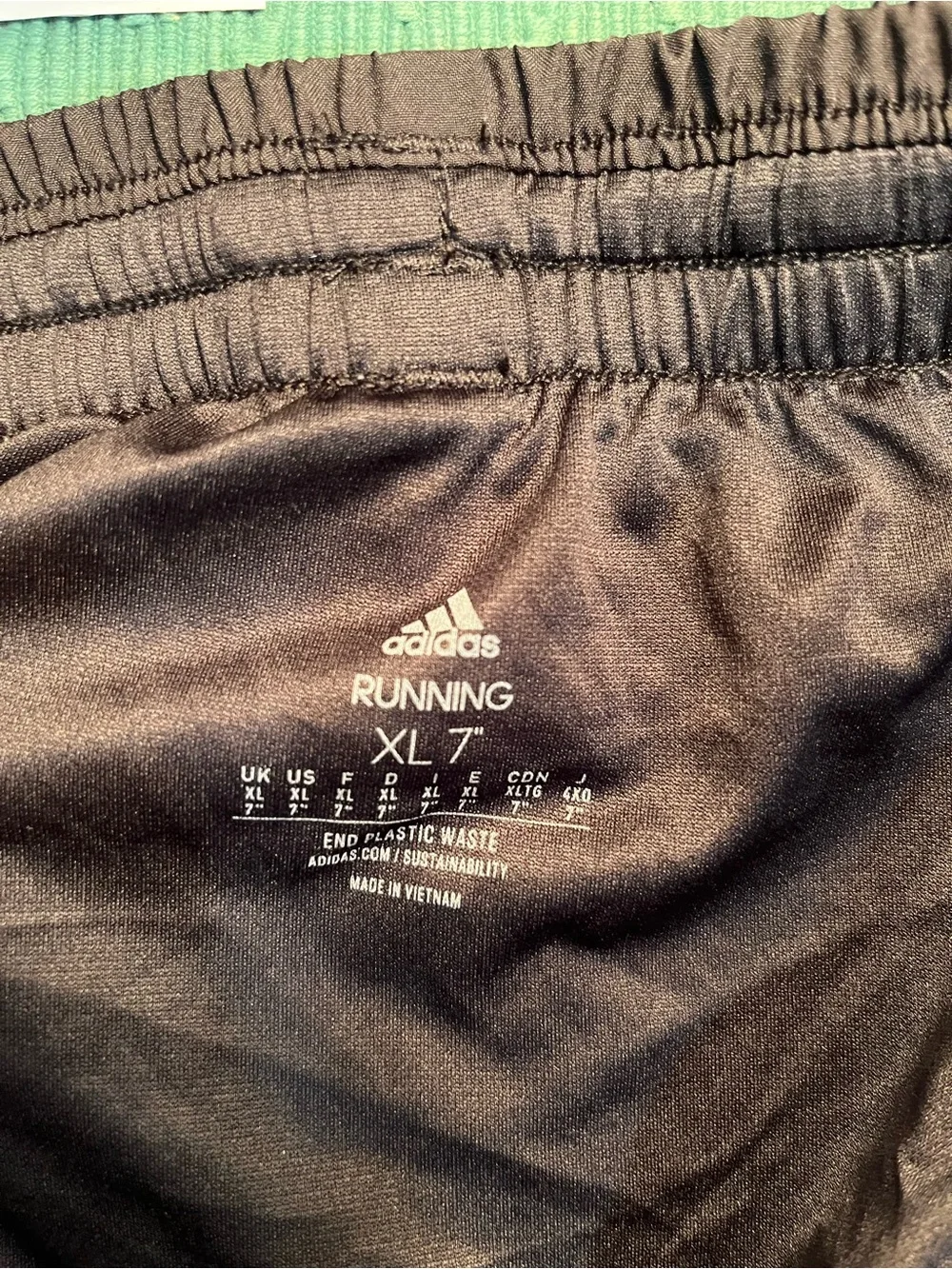 adidas Black Athletic Shorts with White Three-Stripe Accents